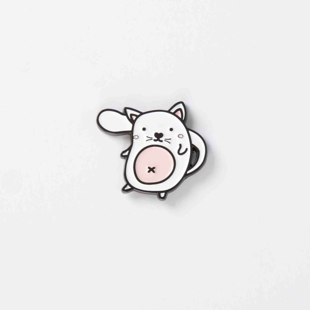 Cat enamel pin on white