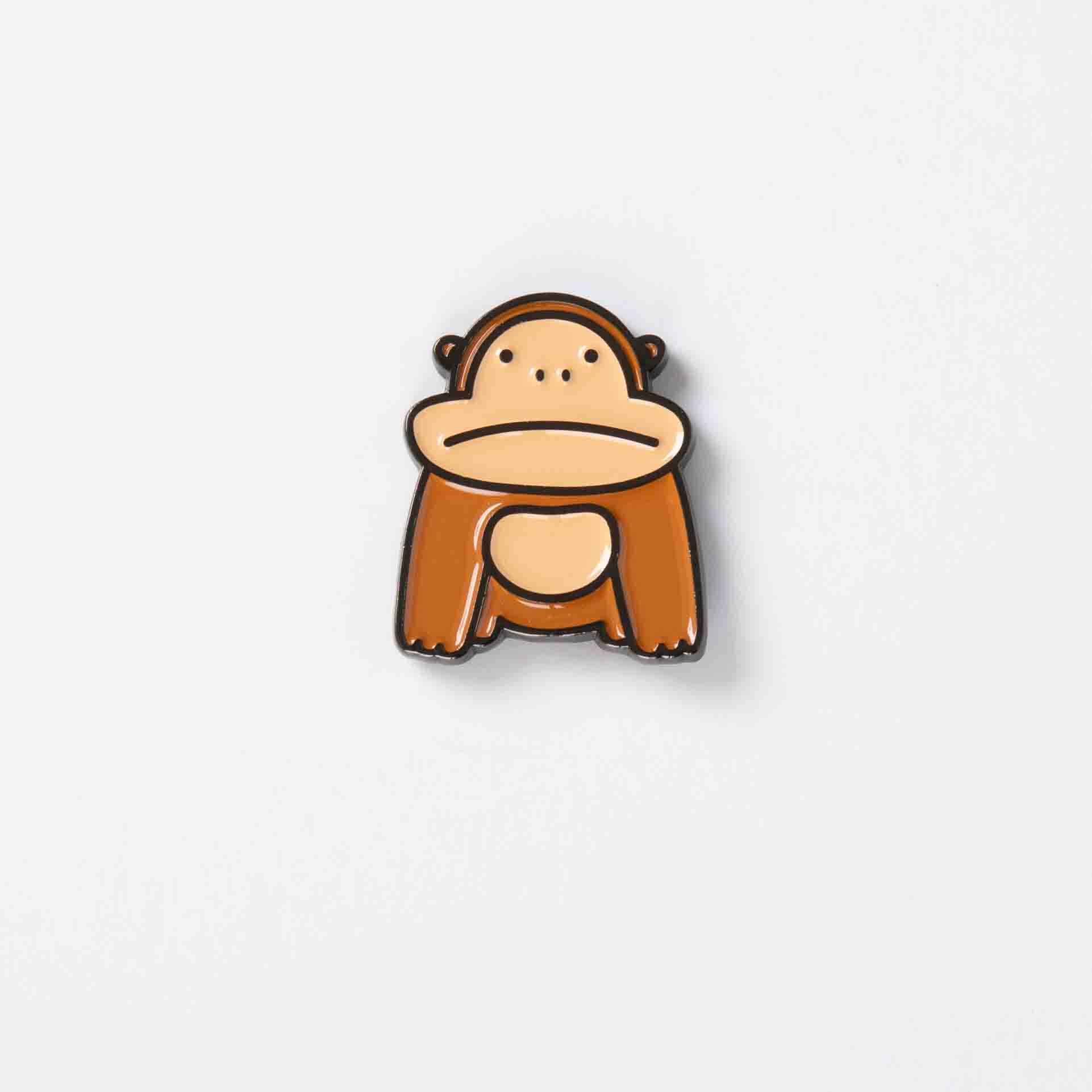 Gorilla enamel pin on white